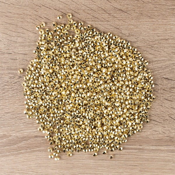 Perlen, Raute, facettiert, 0,6cm x 0,4cm, hellgold, 900 Stück